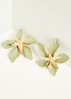 Textured petals are beautifully realistic as they're illuminated by gilded accents on our clip-on earrings. Gold Flower Clip-on Earrings For Spring, Gold Clip-on Earrings For Spring Party, Spring Party Gold Clip-on Earrings, Flower Clip, Ashley Stewart, Accessories Jewelry Earrings, Gold Floral, Gold Texture, Jewelry Gold