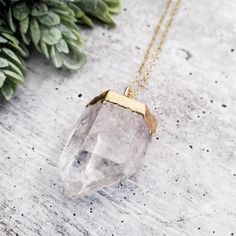 This is the perfect holiday gift for your favorite person!!  This is a gorgeous sparkly clear crystal quartz. It is attached to a beautiful and shiny 14k Gold Filled chain and has a bohemian vibe.This listing is for one quartz crystal similar to the ones pictured. All necklaces come beautifully and simply packaged in an eco-friendly kraft box and twine ready for gifting.About the jewelry:• The clear quartz measures ~1 1/2''(l) by ~ 1/2''(w) and is electroplated with 24k gold. • All components ot Faceted Quartz Necklaces As Gifts, Gold Quartz Crystal Necklace For Gift, Clear Quartz Necklace For Gift, Quartz Faceted Necklace For Gift, Luxury Quartz Spiritual Necklace, Boho Crystal, Quartz Crystal Pendant, Quartz Crystal Necklace, Clear Quartz Crystal