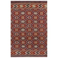 an orange and red rug with geometric designs on the bottom, in different colors and sizes