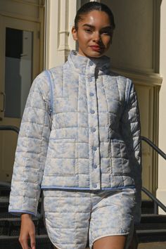 Made from recycled fabric, our lightweight Amelia Quilted Jacket features our original Blue Toile print. Designed as a convertible piece, the Amelia Jacket can be worn as-is or turned into a vest by removing the sleeves. Off-white base with baby blue florals Soft matte quilted fabric Removable sleeves and functional front pockets Lightweight warmth Made from recycled poly Your order will ship from our warehouse in Florida, USA! Toile Print, Removable Sleeves, Blue Toile, Blue Florals, Quilted Fabric, Florida Usa, Waist Pants, Recycled Fabric, Quilted Jacket