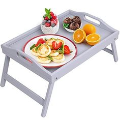 a tray with food and fruit on it