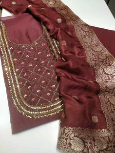 Item Overview ATHARVA Hand Embroidery Salwar Kameez w/Embroidery Neck Maroon/Banarsi Silk Dupatta/Gota Patti/ Custom Stitch/Anarkali/Patiala/ Dno. CH1552B Fabric: * Shirt- Chanderi Silk - Embroidered Neck- Maroon - 2.5 Mts Beautiful Hand Embroidery * Dupatta: Banarsi Silk Dupatta- Zari Meenakari Dupatta- 2.5 Mts- Latkans Tassels- (Motifs may wary) * Bottom Santoon Silk 2.5 Mts. Excusive Hand Embroidered Party Wear Punjabi Suit. Customization: * Fabrics Customization: Designs Can be made in diffe Unstitched Anarkali Churidar For Festive Occasions, Semi-stitched Cutdana Raw Silk Kurta, Unstitched Chanderi Bollywood Anarkali Set, Unstitched Bollywood Chanderi Anarkali Set, Semi-stitched Raw Silk Anarkali Set For Diwali, Anarkali Set With Cutdana On Jamawar Fabric, Cutdana Raw Silk Straight Kurta Churidar, Semi-stitched Anarkali Kurta With Zari Work, Straight Kurta Churidar In Raw Silk With Cutdana