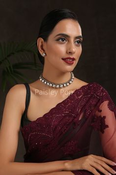 The Polki choker necklace is inspired by the rich Indian jewelry-making techniques handcrafted by the artisans to celebrate perfect armor between ancient and modern concepts. The gold plated western necklace can be paired with your Indo western dresses gracefully. Pair this gorgeous replica of Bollywood jewelry with your ethnic or contemporary ensembles and create a look to remember. Necklace Closure - Adjustable Dhori. Style Tip - The tasteful design will keep you hooked every time you look at Elegant Festive Choker, Traditional Kundan Choker Necklace For Formal Events, Elegant Kundan Choker Necklace With Cutdana, Elegant Choker For Formal Festivals, Festive Bridal Choker Necklace For Formal Occasions, Elegant Formal Choker For Festivals, Festive Formal Bridal Choker Necklace, Luxury Kundan Necklace For Festive Party, Luxury Kundan Necklace For Party And Festive Occasions