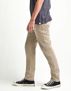 RSQ Slim Chinos. Formerly known as the "London Skinny Chino Pants". Skinny straight leg. Slant front pockets with welt back pockets. Zip fly. Button waist. 97% cotton/3% spandex. Machine wash. Imported. Casual Fitted Dress Pants With Belt Loops, Casual Trousers Dress Pants With Belt Loops, Casual Business Work Pants With Belt Loops, Casual Fitted Work Pants With Belt Loops, Casual Pants With Belt Loops For Business Casual, Casual Summer Work Trousers, Casual Chinos With Tapered Leg And Belt Loops, Casual Tapered Leg Chinos With Belt Loops, Casual Work Pants With Welt Pockets And Straight Hem