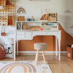 a child's desk and chair in a room