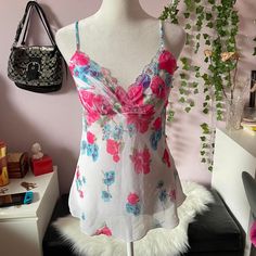 - Adorable vintage camisole top with a floral print - Sheer micro-mesh body and lined cups for coverage - Made in USA - Size medium Vintage Camisole, Thrift Board, Fairy Top, Y2k Tops, Floral Cami, Outfit Design, Y2k Outfits, Pink Floral Print, Art References