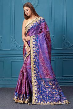 Look royal at weddings and festive occasions in this alluring purple embroidered Patola silk saree, It comes with a matching blouse piece. Disclaimer: The shown stitched blouse on the model is for display purpose only. The saree comes with a matching blouse piece and finished with fall and piko. Purple Katan Silk Pre-draped Saree With Zari Work, Purple Dola Silk Pre-draped Saree, Purple Paithani Silk Pre-draped Saree For Wedding, Purple Katan Silk Pre-draped Saree With Cutdana, Traditional Purple Paithani Silk Pre-draped Saree, Traditional Purple Pre-draped Saree, Festive Purple Tussar Silk Pre-draped Saree, Bollywood Style Purple Art Silk Pre-draped Saree, Purple Pre-draped Saree With Traditional Pallu