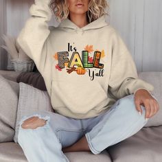 Wrap yourself in the essence of the season with our Hoodie Sweatshirt featuring a captivating Fall Graphic design. Embrace the cozy vibes and autumn spirit exuded by this stylish sweatshirt. With a nod to the season, the "It's Fall Y'all" message on the hoodie adds a touch of playfulness and charm. Made for those crisp days and cool evenings, this sweatshirt will keep you snug and fashionable all at once. Whether you're out for a casual stroll or lounging indoors, this Fall-inspired hoodie is the perfect blend of comfort and flair. Elevate your fall wardrobe with this must-have piece that captures the essence of the season beautifully. Fall Graphic Design, Autumn Spirit, Fall Graphic, Fall Hoodies, Cozy Vibes, Fall Design, It's Fall, Autumn Inspiration, Fall Wardrobe