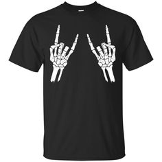 Halloween Skeleton Rocker Graphic T-Shirt available in T-shirt, hoodie, tank top, longsleeve, multi color and size S M L XL XXL 3XL 4XL 5XL. Shipping from the US. Easy 30 day return policy - Shop now! 6.1-ounce, 100% cotton .Double-needle neck, sleeves and hem; Roomy Unisex Fit. Ash is 99% cotton, 1% poly; Sport Grey is 90% cotton, 10% poly; Dark Heather is 50% cotton, 50% polyester .Decoration type: Digital Print. Made by Gildan Halloween Rocker T-shirt For Concerts, Halloween Concert Skull Print Tops, Halloween Skull Print Top For Concert, Halloween Skull Print Tops For Concert, Black Rock Style Tops For Halloween, Rock Style Halloween Tops With Graphic Print, Rock Style Graphic Print Top For Halloween, Halloween Rock Style Crew Neck Tops, Rock Style Skull Print Crew Neck Top