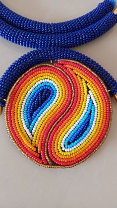 African Necklace, African Jewelry, African Beaded Necklace, Zulu Beaded Necklace, Dark Blue Necklace, Pendant Necklace, Gift For Her This stunning pendant necklace is superbly crafted which makes you stands out in any occasion. Main Color - Dark Blue or Royal Blue. Different colors of your choice can be available. Wholesale available at a fair price. For any query please send me a convo or an e-mail. Happy Shopping Unique Blue Beaded Necklaces, Unique Blue Beaded Chain Necklace, Unique Blue Beaded Necklace, Handmade Blue Beaded Necklaces With Oval Beads, Handmade Blue Beaded Necklace With Oval Beads, Blue Oval Bead Necklaces, Blue Beaded Oval Necklaces, Blue Beaded Necklaces With Colorful Beads, Blue Oval Beaded Chain Necklaces