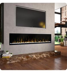 an electric fireplace in a living room with a flat screen tv on the wall above it