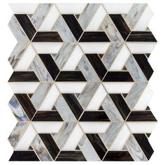 a white and black mosaic tile pattern with an irregular design in the center, on top of