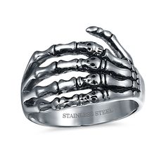 Bring your dark side to the forefront when you wear this thrilling Gothic-style oxidized skeleton hand wrap band for men. Created in stainless steel This choice wraps your finger with a sculpted skeleton hand. Four skulls add spine-chilling detail while the oxidized finish lends depth and dimension. Skeleton Jewelry, Biker Rings Mens, Goth Biker, Bone Ring, Chic Rings, Biker Rings, Punk Rocker, Skeleton Hand, Skeleton Hands