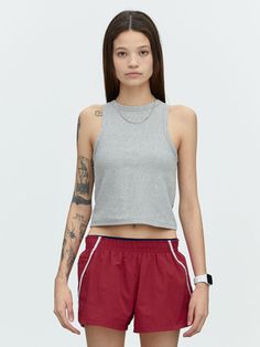 This is a trendy and casual top by MENASOO that is made out of high quality and sturdy material. With distinctive mood of the design and comfortable wear, you can style it for your casual daily outfit.- Fabric with excellent shape retention- Detachable bra caps for easy wash- Sporty and casual mood Gray Athleisure Crop Top For Summer, Sporty Gray Stretch Crop Top, Gray Stretch Cotton Crop Top, Basic Gray Sleeveless Tops, Gray Crew Neck Tank Top Casual, Casual Sleeveless Gray Crop Top, Casual Gray Sleeveless Crop Top, Gray Crew Neck Tank Top, Gray Crew Neck Casual Tank Top