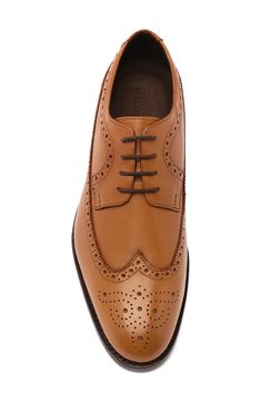 Dapper broguing adds classic refinement to this rich wingtip derby crafted from fine calf leathers with a cushy, dual-density insole. Leather upper and lining/rubber sole Imported Asian Owned/Founded Classic Wingtip Oxford For Business, Classic Wingtip Oxford Shoes For Business, Business Wingtip Oxford With Leather Sole, Classic Oxford Shoes With Brogue Detailing, Business Wingtip Oxford Shoes With Goodyear Welt, Classic Brogue-detailed Oxford Shoes For Semi-formal Occasions, Classic Brogue Oxford Shoes For Semi-formal Occasions, Timeless Wingtip Oxford For Derby, Timeless Wingtip Oxford Shoes For Derby