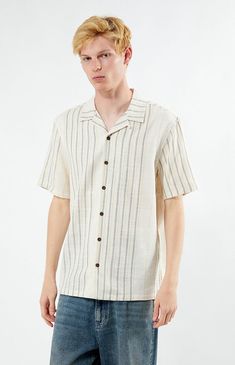 Embrace effortless style with the Neutral Striped Camp Shirt from PacSun. Made from soft cotton, this shirt features a relaxed fit, classic collared neckline, and short sleeves, making it a versatile and comfortable addition to your casual wardrobe.Collared necklineShort sleevesStandard fitStripedButton closures100% CottonMachine washableModel is wearing size mediumModel Measurements: 6â3â Height, 28â Waist, 33.5â Hips PacSun Mens Neutral Striped Camp Shirt - Multicolor size Large Striped Cotton Camp Shirt With Camp Collar, Spring Camp Collar T-shirt With Relaxed Fit, Relaxed Fit Collared T-shirt For Beach, Striped Shirt With Camp Collar And Relaxed Fit, Beige Camp Shirt With Relaxed Fit And Camp Collar, Summer T-shirt With Placket And Short Sleeves, Striped Cotton Camp Shirt For Spring, Collared Cotton T-shirt For Beach, Beige Relaxed Fit Camp Shirt For The Beach