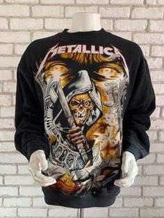 This is a great Metallica sweater from the early 90's The design is awesome, printed back and frontIt is in perfect condition and has never been worn Size L on tagPit to pit : 23.23 inchesTotal length: 27.17  inchesAs for all of my tee shirts, there's only one so take it or miss it :)Other model of Metallica shirt here : https://www.etsy.com/listing/547277108/metallica-1993-vintage-metallifukinca-t?ref=shop_home_active_3To enjoy exclusive updates on all our products, follow us on Instagram, Pint Y2k Graphic Print Sweatshirt For Streetwear, Y2k Long Sleeve Graphic Print Sweatshirt, Y2k Graphic Print Long Sleeve Sweatshirt, 90s Long Sleeve Streetwear Sweatshirt, 90s Style Long Sleeve Streetwear Sweatshirt, Y2k Cotton Streetwear Sweater, Y2k Cotton Sweater For Streetwear, 90s Style Long Sleeve Sweatshirt Fan Merchandise, Vintage Fall Streetwear Sweatshirt