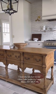 a large kitchen island in the middle of a room