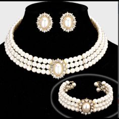 Gorgeous Rhinestone Trimmed Pearl Necklace Three-Piece Necklace Set. Perfect For Bride, Bridal Party & Any Special Occasion. Description: Necklace Size: 11 + 3 L Decor Size: 1 L Bracelet Size: 1 H / Cuff Earrings Size: 1 L This Item Is Non-Returnable Vintage Pearl Necklace Set, Luxury Festive Jewelry Sets With Pearl Drop, Pearl And Diamond Necklace Set, Royal Accessories Necklace, Luxury Festive Temple Necklace With Pearl Drop, Pearl Choker Wedding, White Pearl Choker, Formal Necklace, Clear Necklace