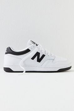 Retro-inspired and ultra-cool, these heritage sneakers from New Balance feature a low-profile design taking cues from classic basketball styles with a super cushioned interior and leather paneled uppers. **Features:** Low-top style, paneled leather fabrication, perforated toe box, padded tongue and collar, Ortholite cushioning, " N" logo graphic, two-tone rubber outsole, lace-up closure **Why We | 480 Court Sneakers by New Balance at Free People in Black, Size: US 6.5 M Sporty Lace-up Basketball Shoes For Streetwear, Classic Lace-up Basketball Shoes With Contrast Sole, Classic Basketball Shoes With Cushioned Footbed For Streetwear, Low-top Basketball Shoes With Gum Sole For Streetwear, White Low-top Throwback Sneakers, Streetwear Low-top Basketball Shoes With Gum Sole, Low-top Basketball Shoes With Cushioned Footbed For Streetwear, Classic Streetwear Basketball Shoes With Round Toe, Classic Basketball Shoes With Gum Sole And Round Toe