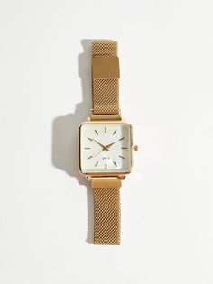 You're just in time to get ahold of this gorgeous watch! With its feminine square shape and luxurious gold color, you'll be checking the time in style. Rich Mom Jewelry, Timeless Gold Watch Accessories As A Gift, Trendy Gold Watches With Metal Dial, Engagement Watches For Women, Timeless Gold Watch As A Gift, Trendy Rectangular Dial Watch As A Gift, Trendy Formal Watch With Rectangular Dial, Trendy Rectangular Dial Watch As Gift, Trendy Gold Watch With Rectangular Dial