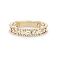 a yellow gold ring with diamonds on it