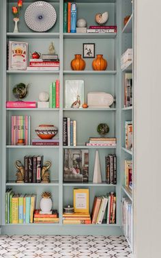 a bookshelf filled with lots of different types of books