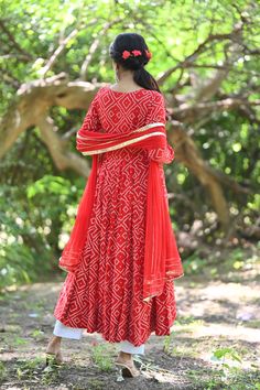 PRODUCT DESCRIPTION :-Time to Flaunt you 'Desi side' with this beautiful red Bhandej anarkali.Anarkali :- Reyon cottonPant :- CottonDupatta :- ChiffonColor:-Anarkali and dupatta - Red Pant - Off whiteCare Instructions :- Dry clean onlyModel Size :- Model is wearing XS sizeModel Height :- 5.6''DISCLAIMER :- Slight color variations may occur due to different screen resolution. Red Floor-length Anarkali Set With Dupatta, Red Anarkali Set For Navratri, Red Anarkali Set With Straight Kurta, Red Bollywood Anarkali Set With Straight Kurta, Red Anarkali Set For Diwali, Red Anarkali Kurta For Festivals, Red Cutdana Anarkali Set Maxi Length, Red Semi-stitched Anarkali Set, Red Anarkali Set With Dupatta For Navratri