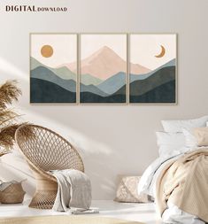 three paintings on the wall above a bed in a room with a wicker chair