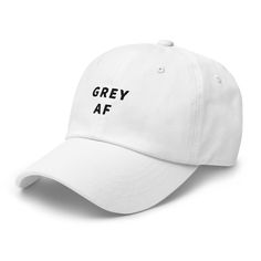 Embrace your fabulous silver strands with the Grey AF hat, a bold statement piece that celebrates aging with confidence. Crafted from high-quality, breathable fabric, this hat offers both comfort and style for everyday wear. The "Grey AF" message proudly highlights your natural beauty and individuality, making it a standout accessory. Whether you're out and about or enjoying a casual day, the Grey AF hat is a fun and stylish way to showcase your unique look. *FREE WORLDWIDE SHIPPING OVER $50* • Gray Adjustable Baseball Cap For Summer, Adjustable Gray Baseball Cap For Summer, Gray Baseball Cap For Summer, Gray Letter Print Cap, Casual Gray Sun Hat With Curved Brim, Gray Adjustable Snapback Hat For Summer, Summer Gray Snapback Hat With Adjustable Fit, Adjustable Gray Sun Hat With Curved Brim, Gray Adjustable Curved Brim Sun Hat