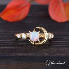 Unique Sun And Moon Ring Yellow Gold Opal Engagement Ring Vintage Celestial Ring Half Eternity Moissanite Ring Birthstone Ring Gift For Her Check the stud earrings: https://www.etsy.com/listing/1751746120/ Check the necklace: https://www.etsy.com/listing/1765953303/ 🌙 Product Details -Main Stone: High-quality Lab Opal, 5mm Round Cut -Side Stone: Moissanite, DEF Color, VVS-VS Clarity, 0.18ct Total -Ring Band: 1.5mm -Metal Choice: 925 Sterling Silver/10K/14K/18K Solid Gold (Rose, White, or Yellow Celestial Crescent Moonstone Ring For Anniversary, Celestial Style Opal Ring, Crescent Moonstone Promise Ring, Celestial Round Cut Jewelry With Halo, Celestial Jewelry With Halo Round Cut, Celestial Yellow Gold Round Opal Ring, Celestial Style Round Band Rings As Gift, Celestial Yellow Gold Opal Ring, Elegant White Crescent Rings