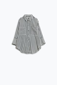 Elevate your wardrobe with our White Shirt with Black Stripes and Chest Pockets. This classic shirt features a timeless stripe design that adds a touch of sophistication to your look. Crafted from a blend of 60% polyester and 40% viscose, this shirt is soft, comfortable, and perfect for all-day wear. The relaxed fit ensures a flattering silhouette, while the chest pockets and button detail add a touch of elegance. Model is wearing size U. Pair this shirt with jeans for a casual look or dress it up with trousers for a more polished ensemble. Whether you're heading to the office or out for brunch, this shirt is sure to become a staple in your wardrobe. Shop now at Szua Store and add the White Shirt with Black Stripes and Chest Pockets to your collection! Classic Pinstripe Shirt With Pockets, Casual Striped Tops With Roll-up Sleeves, Classic Relaxed Fit Blouse With Vertical Stripes, Summer Workwear Tops With Striped Cuffs, Summer Tops With Striped Cuffs For Workwear, Classic Blouse With Vertical Stripes And Relaxed Fit, Elegant Black Top With Vertical Stripes, Chic Button-up Top With Vertical Stripes, Chic Shirt With Striped Collar And Relaxed Fit