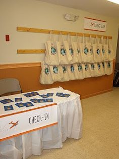 an airport check - in desk is set up for passengers