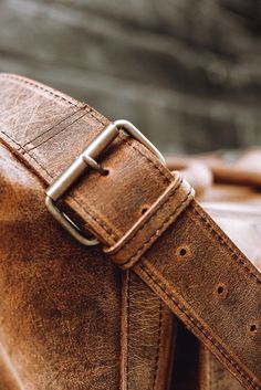 Our leather barrel gym bag is a really versatile bag - from the gym to weekend aways. This leather bag for men can do it all. Bring this practical leather barrel bag into your life today. #leatherbag #leathergoods #handmadeleather #leathercraft #mensstyle #mensfashion Barrel Bag