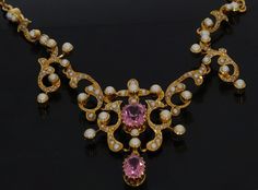 Handmade 14 carat gold choker with pendant in which put dozens of seed pearls and 2 beautiful pink Tourmalines. Carrying length of this piece of jewelry is 44cm, width pendant 13cm, width anchor link 2mm, total weight 20 grams. Unique jewelry for the collector, condition excellent, stamped with the 585 gold mark, Dutch approved oak leaf. The jewelry is shipped well packaged and insured. Exquisite Pink Pendant Necklace, Pink Pendant Necklace With Pearl, Antique Pink Necklaces For Wedding, Pink Pendant Pearl Necklace For Wedding, Elegant Pink Pendant Pearl Necklace, Elegant Pink Pearl Pendant Necklace, Choker With Pendant, Ladies Necklace, Golden Design