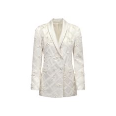 a women's white jacket with an embroidered design on the chest and lapel