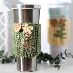 a crocheted cup cozying is sitting on a table