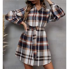 Elevate Your Style Game With This Long Plaid Printed Shacket Jacket. This Versatile Midi-Length Coat Dress Is Designed To Impress, Featuring A Gorgeous Multicolored Plaid Print, Lapel Collar And Distinctive Flap Pockets. The Detachable Adjustable Belt Cinches Your Waist Perfectly, Creating A Flattering Silhouette That's Sure To Turn Heads. Whether You're Layering Up For The Cooler Months Or Adding A Stylish Touch To Your Ensemble, This Shacket Trench Coat Is The Ultimate Go-To Piece. With Its On Long Sleeve Belted Cuffs Shirt Dress For Fall, Fall Knee-length Single-breasted Outerwear, Belted Fitted Shirt Dress For Fall, Fitted Belted Shirt Dress For Fall, Beige Long Sleeve Dress With Belted Cuffs, White Fall Shirt Dress For Daywear, White Shirt Dress For Fall Daywear, White Shirt Dress For Daywear In Fall, Fall Workwear Shirt Dress With Belted Cuffs