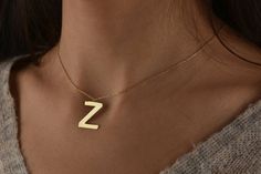 This personalized initial necklace is 14k Solid GOLD ( not filled or plated).  Personalized solid gold necklace in 14k Gold, Rose Gold, White Gold.  You can customize this 14k solid gold necklace with a letter of your choice.  #personalizednecklace #VivaRing #14kgoldnecklace #personalizedchoker #customnecklace #PersonalizedJewelry #personalizedgift #namenecklace #initialnecklace  #lovegifts #personalizedpendant #birthdaygiftromantic #romanticgifts #giftsforbestfriend Modern Gold Name Necklace For Gifting, Modern Gold Initial Necklace Gift, Modern Gold Name Necklace For Gift, Modern Gold Initials Name Necklace, Modern Gold Necklace With Initials, Modern Gold Initial Pendant Necklace, Polished Initial Necklace As Gift, Elegant Polished Initial Necklace As Gift, Elegant Polished Initial Necklace Gift