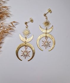 Crescent moon goddess dangle earrings - gold moon phase fewelry for a boho and chic look DETAILS: Metal Material: Stainless Steel and brass accents Length: 6 cm SHIPPING: We strive to dispatch your order promptly, ensuring timely delivery. Estimated delivery times after dispatch: - Netherlands: 1-3 days - Europe: 1-2 weeks - UK: 1-2 weeks - USA: Approximately 3 weeks Gift Wrapping Option: When placing your order, you can choose to have your earrings beautifully gift-wrapped, arriving in a jewelr Celestial Earring, Earring Star, Goddess Earrings, Star Earring, Earrings Moon, Celestial Earrings, Gold Moon, Moon Goddess, Moon Star