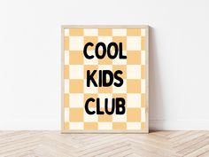 a poster with the words cool kids club on it in black and yellow checkerboard