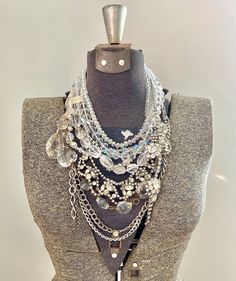 * This is a CUSTOM ORDER, please allow 2-3 weeks for creation!  I will be in contact with you the entire time as you choose what specialized rhinestone pieces you want in your unique statement piece made just for you. * This bib style necklace can be worn at all times of the year and is sure to be a staple in your collection for many years to come. Sometimes you just need a crystal clear necklace to go with anything all year round.  I have a lot of vintage rhinestone pieces in my inventory that Costume Jewelry Necklace With Bling, Crystal Jewelry With Rhinestones For Crafting, Wedding Necklaces With Rhinestones, Bling Rhinestone Necklace As A Gift, Bling Crystal Costume Necklaces, Glamorous Jewelry With Bling, Dazzling Jeweled Silver Necklaces, Dazzling Jeweled Silver Necklace, Crystal Jeweled Bridal Necklace In Costume Style