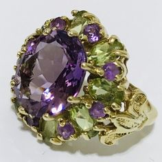 Vintage 10k Gorgeous One-Of-A-Kind Solid Yellow Gold Natural 12mm - 6 Carat Amethyst & Peridot Stone Ring . Size 5 Total Weight 6 G Please Make Sure Of The Size Of The Ring You Are Looking . This Ring Is Size 5 And Cannot Be Resized Attempting To Do That Can Damage The Ring Permanently And You Cannot Return The Ring After Damage In It . Please Ask Any Question Regarding This Item Before Purchasing We Do Combine Shipping, Shipping Only U.S.A 48 States No International Shipping For This Item. Peridot Stone, Gold Cocktail, Peridot Ring, Solid Yellow, Stone Ring, Womens Jewelry Rings, Purple Gold, Stone Rings, Solid Gold