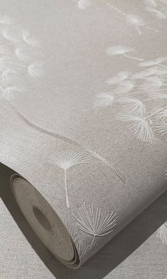 a close up view of a wallpaper with white flowers and leaves on grey background