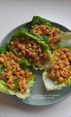 lettuce wraps with chickpeas and carrots on them are ready to be eaten