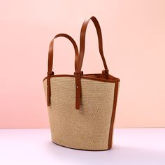 Add a summer-inspired touch to your accessories edit with this straw bucket tote bag. Woven from straw with leather trimmings, this handbag makes us look forward to summer and escapism. It comes with an open top and is roomy enough for all your essentials. Easy-to-wear wardrobe staples that combine classic and contemporary styles.Width (cm): 28 cmHeight (cm): 16 Color: Light brownInterior Material: Polyester CottonMaterial_bag: StrawBagType: Handbag & Shoulder bagBag Length: 28 cm French Baskets, Bucket Tote Bag, Bucket Tote, Basket Tote, Brown Interior, Straw Bags, Straw Tote, How To Make Handbags, Open Top