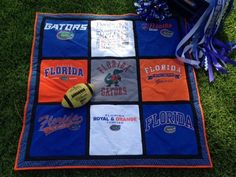 the florida gators blanket is laying on the grass with confetti and ribbons