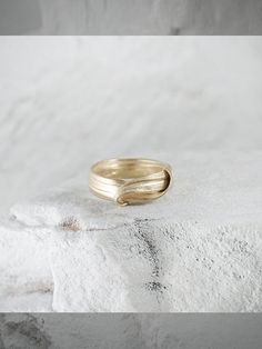 "A Perfect ring for an engagement & wedding or even as an elegant layer for an everyday ring mix. This is a trully unique piece, filled with elegance and charm and \"movement\". It is bound to become a cherished gift for your loved one. > 14K or 9K solid gold, also available in Goldplated Silver. > Can be made in yellow, white and rose 9k or 14k solid gold. Please choose a material > Ring width:approximately 4 mm > Handmade in Greece For additional sizes (also for quarter and hal Modern Open Band Wide Ring For Wedding, Modern Open Wide Band Ring For Wedding, Modern Twist Bypass Ring For Wedding, Modern Jewelry With Decorative Band For Anniversary, Timeless Ring With Decorative Band For Promise, Timeless Promise Ring With Decorative Band, Elegant Stackable Wide Band Ring For Wedding, Modern Adjustable Wide Band Ring For Wedding, Modern Jewelry With Decorative Band Ring