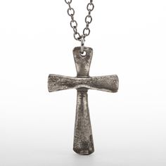 This Vintage Style Cross is handmade of solid Sterling Silver (92.5% pure silver) in my studio. The cross is hand hammered and I use a dark patina to bring out the details and give it the worn out look of time. Cross Height: 1 1/2 inches (4 cm) Width: 1 inch (2.5cm) Necklace chain: choose your length and material Crosses For Men, Hand Forged Silver Cross Necklace, Sterling Silver Crosses, Medieval Silver Cross Pendant Jewelry, Sterling Silver Cross Amulet, Vintage Antique Silver Cross Pendant, Sterling Silver Cross Necklace, Hallmarked, Vintage Pendant Necklace, Hammered Sterling Silver