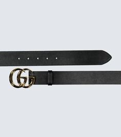 Crafted in Italy from leather, this black belt from Gucci features the label's double G buckle logo in gold, this style comes with punch holes for an adjustable fit..Color of fastening: gold.Made in Italy.Material: calf leather.Width 4cm-1.5' Black Leather Belt Buckle With Metal Logo, Classic Black Belt With Metal Logo, Designer Black Belts With Metal Logo, Designer Black Belt With Metal Logo, Designer Black Belt With Buckle, Designer Black Belts With Buckle Closure, Designer Black Belt With Buckle Closure, Designer Belts With Metal Logo For Business, Business Leather Belt Buckles With Metal Logo